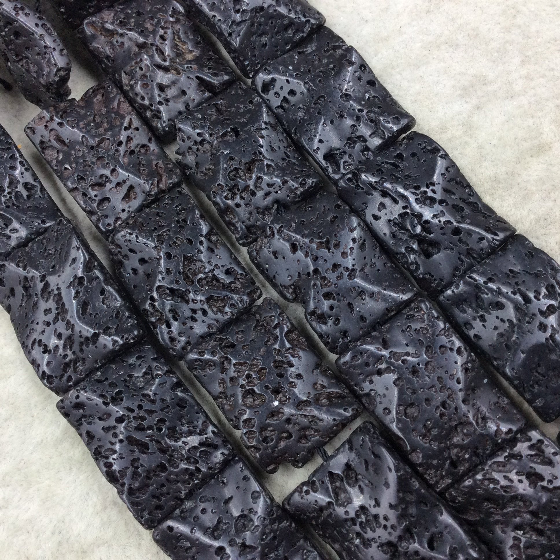 18mm x 26mm Waxed/Coated Black Colored Volcanic Lava Rock Wavy Rectangle Shape Beads W 1mm Holes - Sold by 15.25" Strands (Approx. 16 Beads)