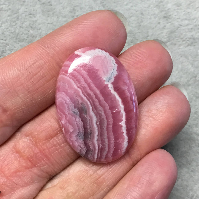 OOAK AAA Rhodochrosite Oblong Oval Shaped Flat Back Cabochon "6" - Measuring 24mm x 34mm, 5mm Dome Height - Natural High Quality Gemstone