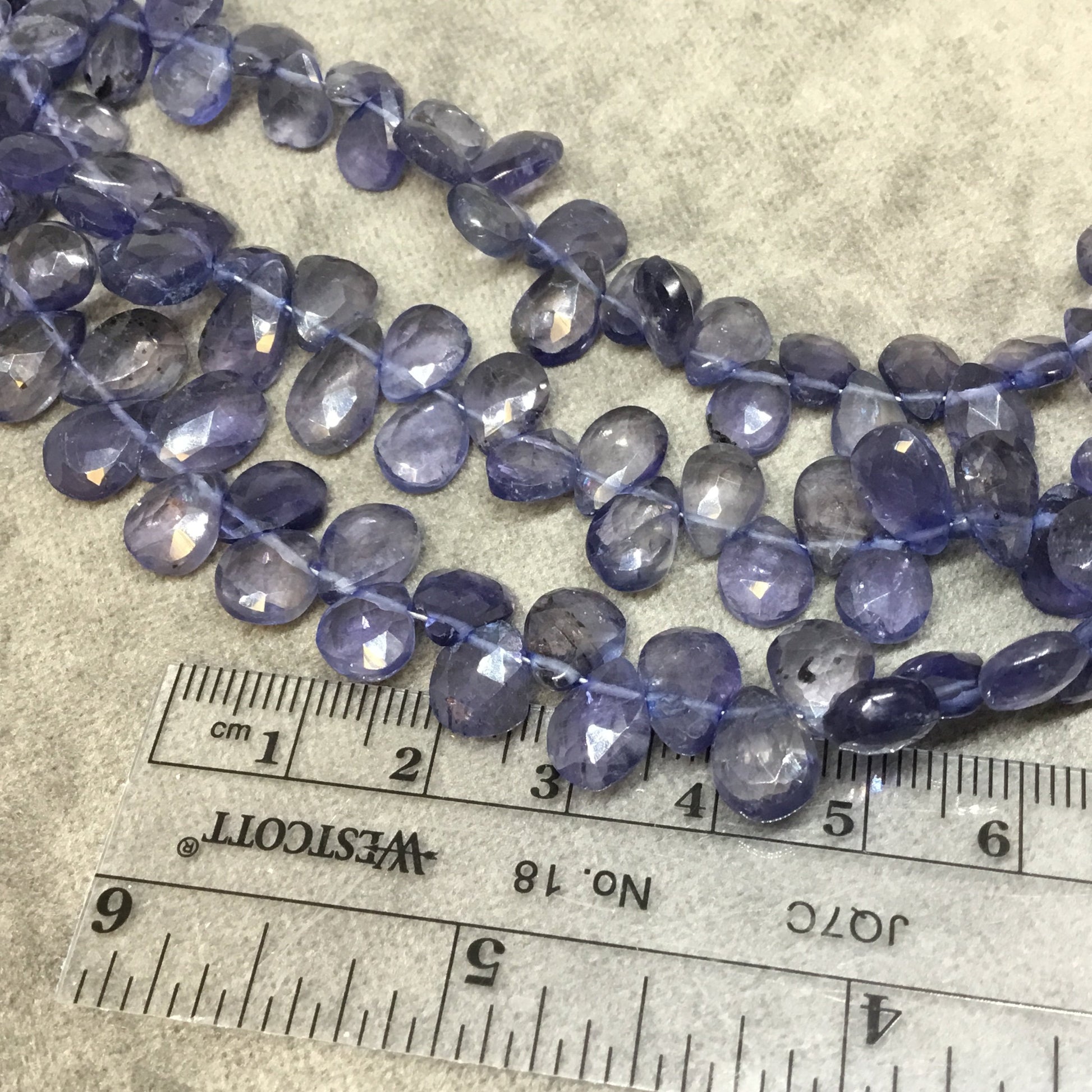 6-7mm x 8-9mm Faceted Pear/Teardrop Shaped Light Iolite Beads - 9" Strand ( ~54 Beads) - High Quality Hand-Cut Semi-Precious Gemstone