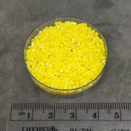 Size 11/0 Glossy Finish Opaque Yellow AB Genuine Miyuki Delica Glass Seed Beads - Sold by 7.2 Gram Tubes (Approx. 1300 Beads per 2" Tube)