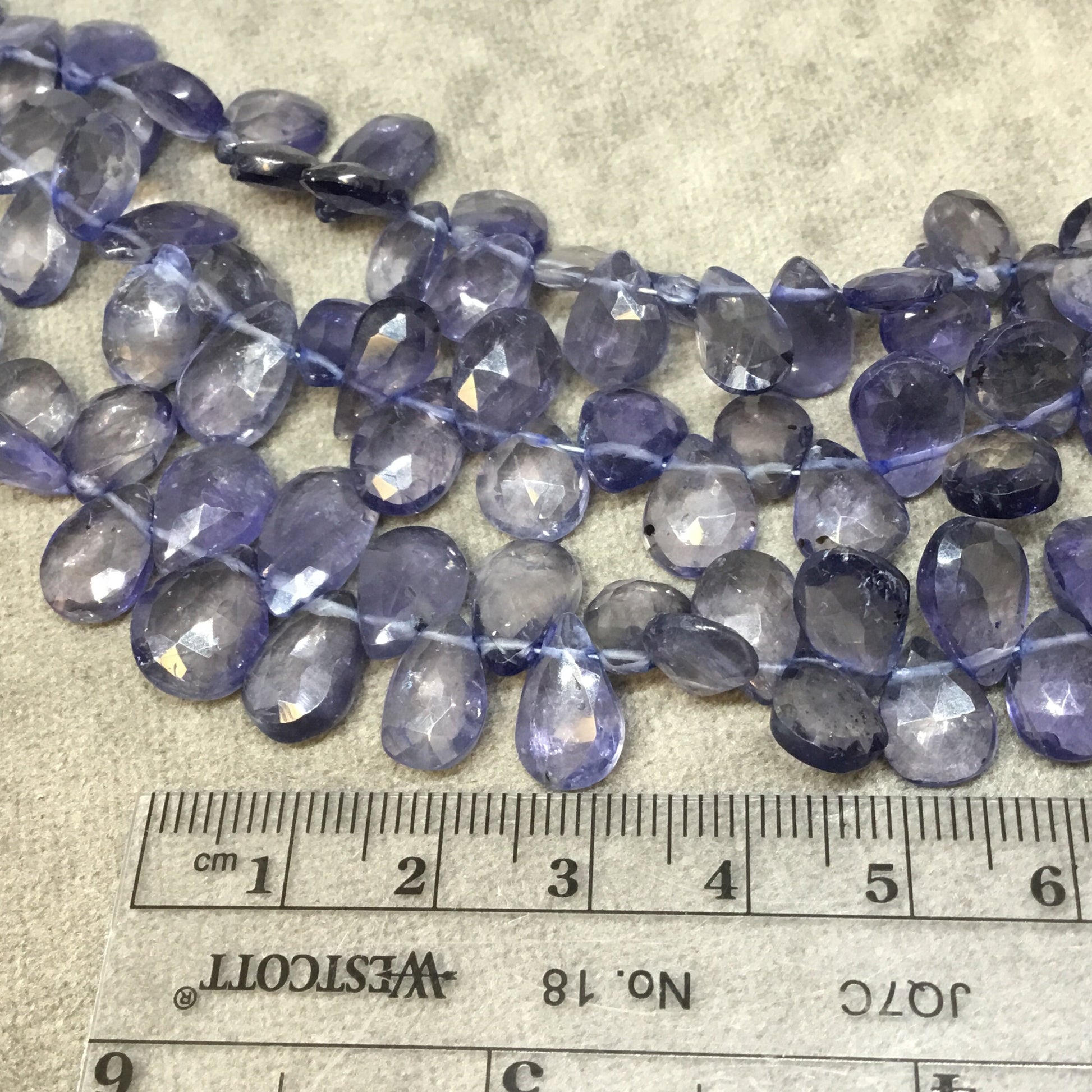 6-8mm x 8-10mm Faceted Pear/Teardrop Shaped Light Iolite Beads - 9" Strand ( ~48 Beads) - High Quality Hand-Cut Semi-Precious Gemstone