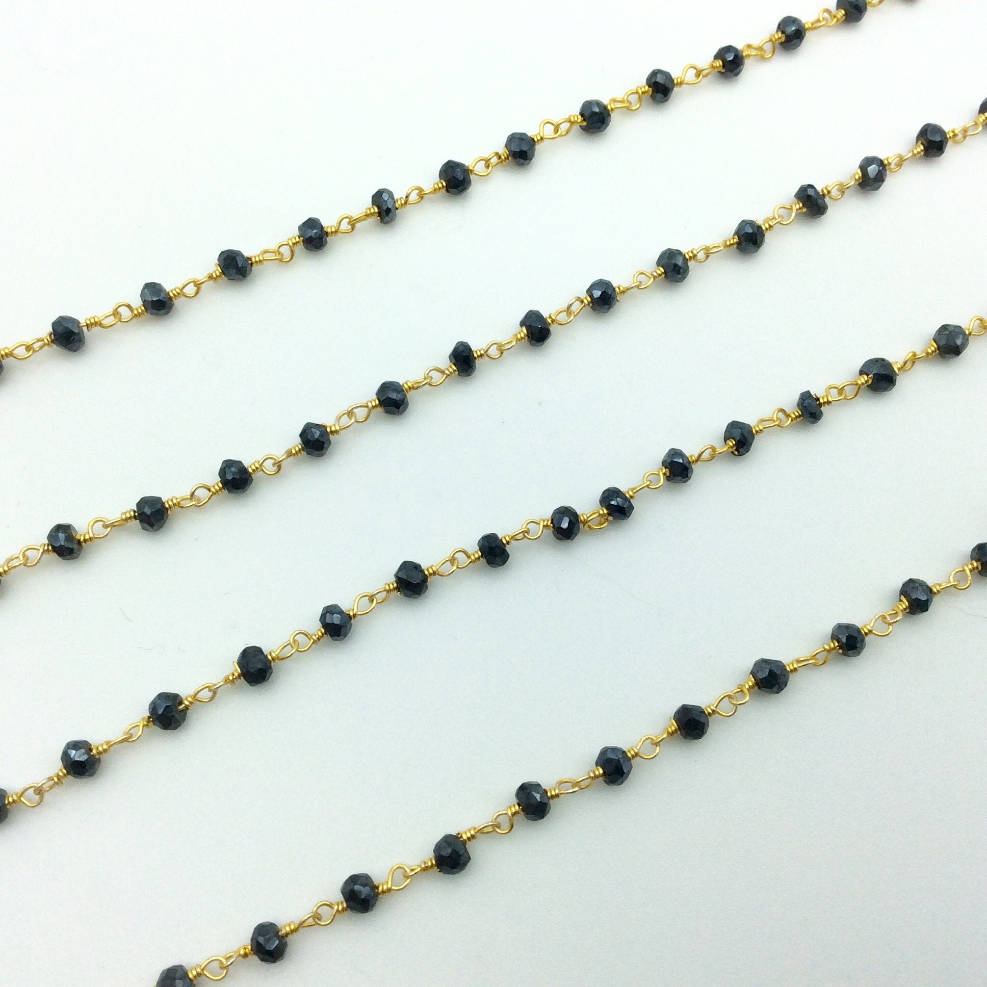 Gold Plated Copper Rosary Chain with Faceted 3-4mm Rondelle Shaped Mystic Coated Black Spinel Beads - Sold Per Ft - (CH157-GD)
