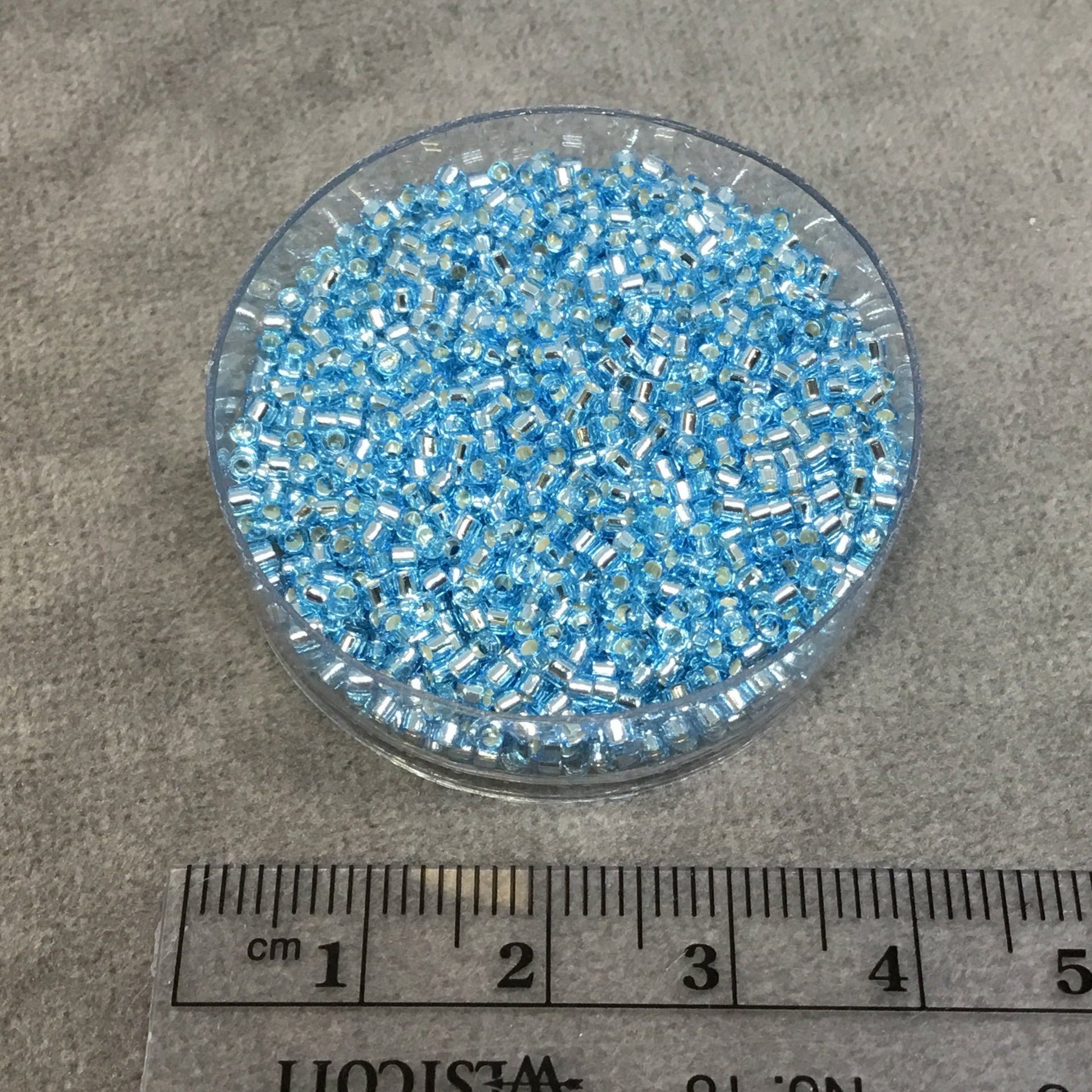 Size 11/0 Glossy Silver Lined Light Blue Genuine Miyuki Delica Glass Seed Beads - Sold by 7.2 Gram Tubes (Approx. 1300 Beads per 2" Tube)