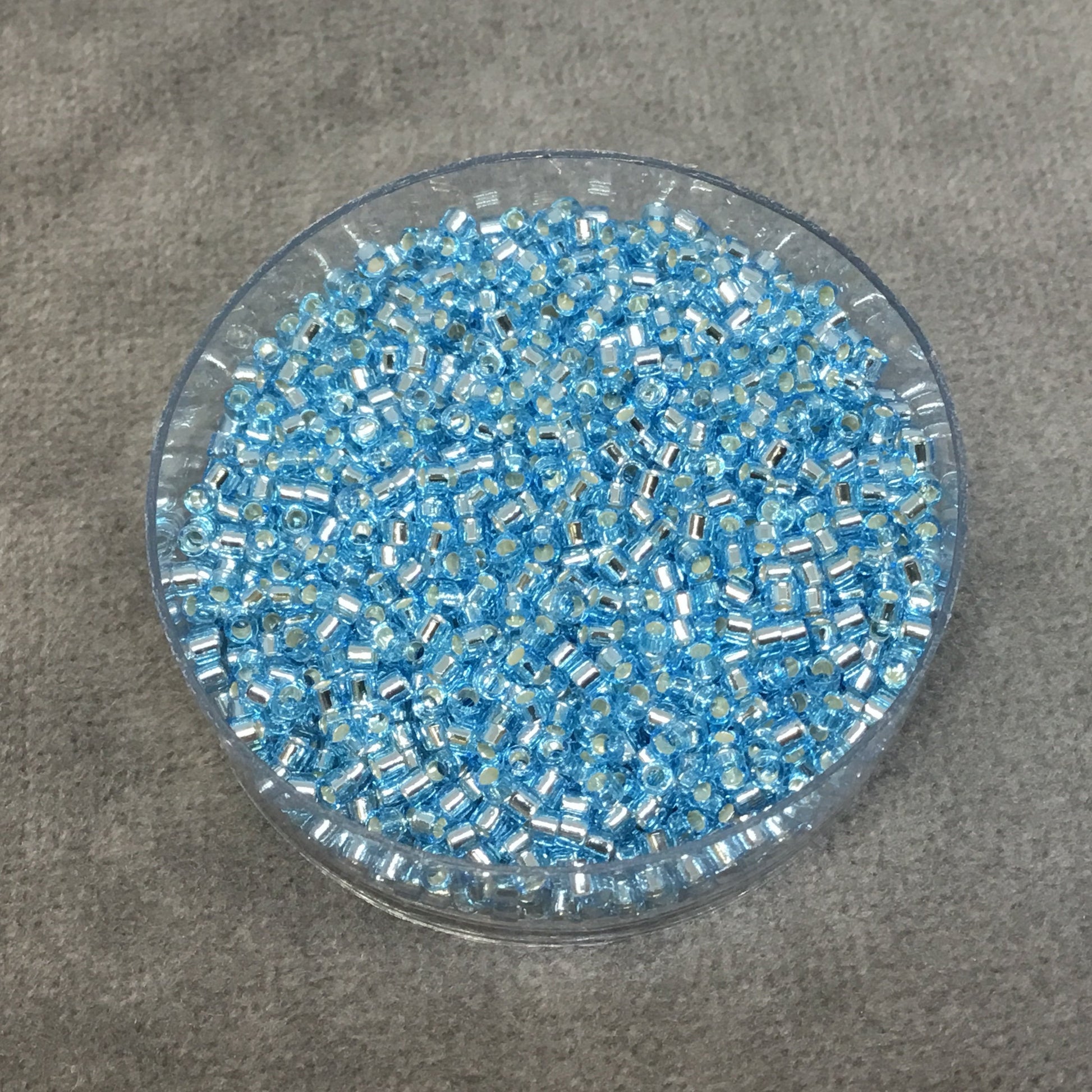 Size 11/0 Glossy Silver Lined Light Blue Genuine Miyuki Delica Glass Seed Beads - Sold by 7.2 Gram Tubes (Approx. 1300 Beads per 2" Tube)