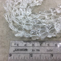 12mm x 15mm Glossy Faceted Transparent/Metallic Clear Crystal Glass Butterfly Shaped Beads - Sold By 12" Strands (~ 25 Beads)