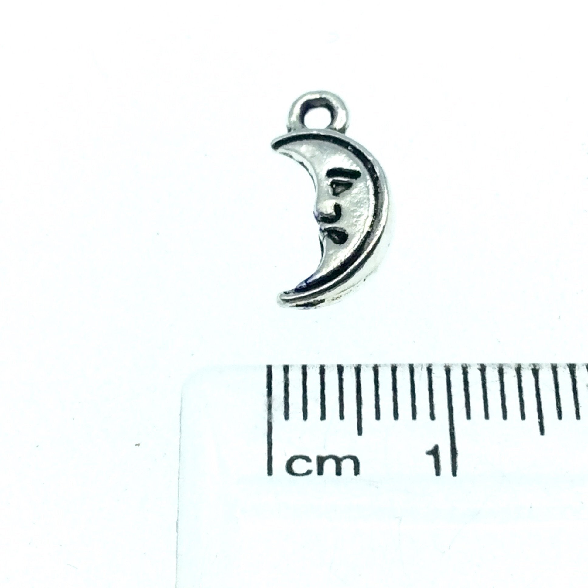 Silver Plated Half Crescent/Moon with Face Pendant with One Ring- Measuring 5mm x 10mm - Sold Individually, Chosen at Random