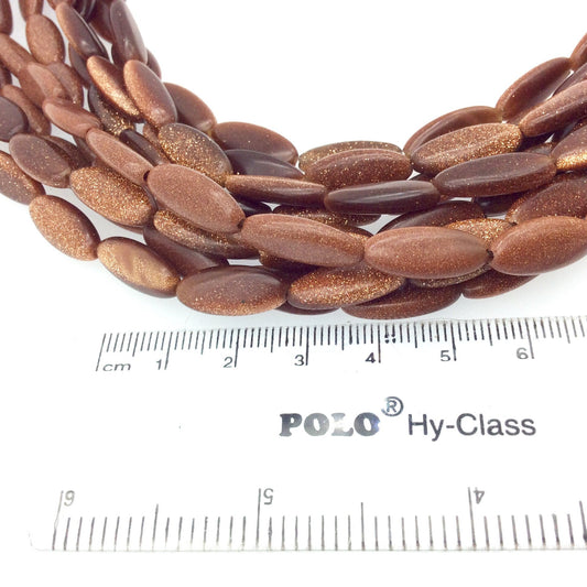 7mm x 15mm Smooth Manmade Goldstone Elongated Oval Shaped Beads with 1mm Holes - Sold by 14.5" Strands (Approx. 22 Beads)