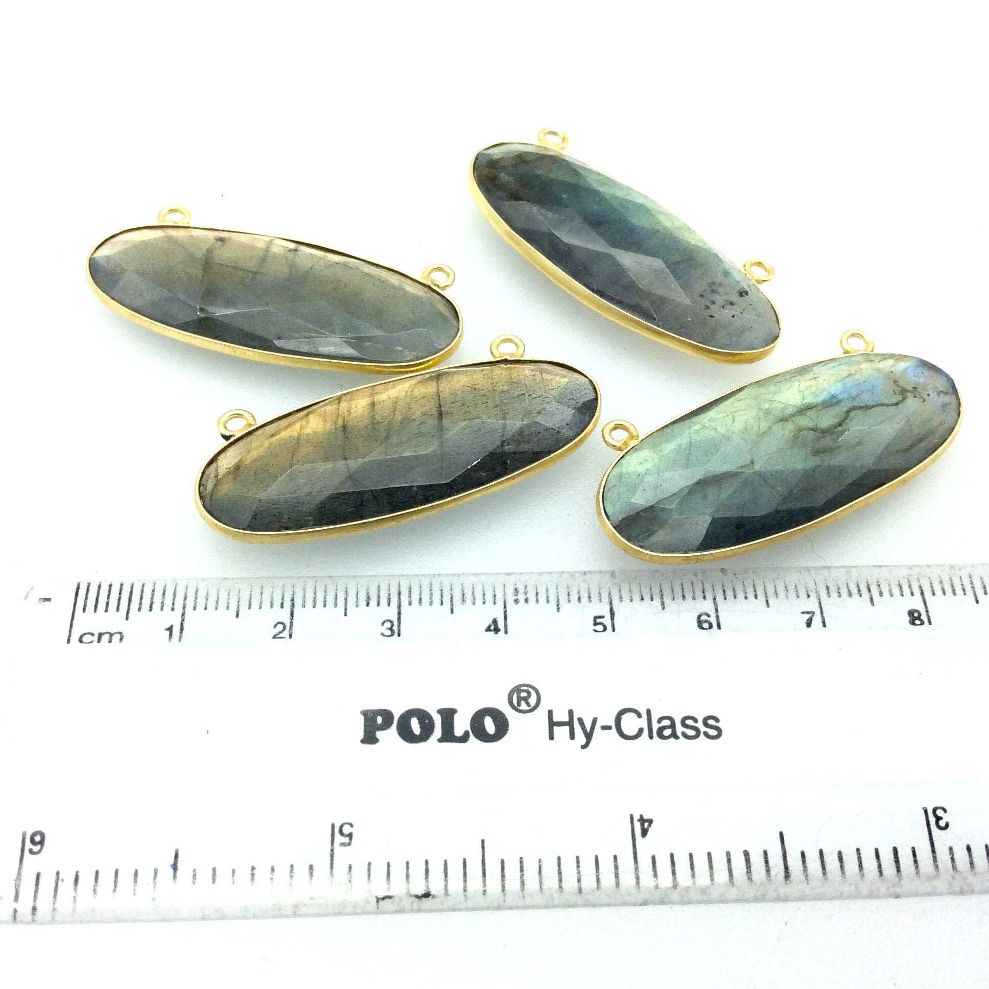 Labradorite Bezel | Gold Plated Faceted Natural Iridescent Oval Shaped Pendant-Measuring 40mm x 15mm . Sold individually. chosen Randomally.