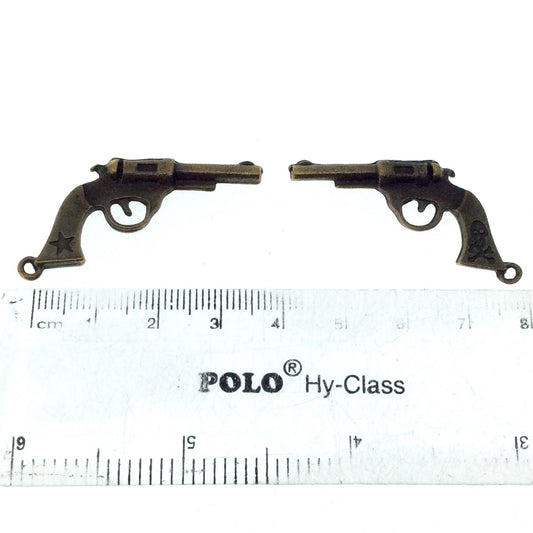 Antique Brass Plated Copper Gun W Skull and Cross Bones Pendant with One Ring- Measuring 18mm x 35mm - Sold Individually, Chosen at Random