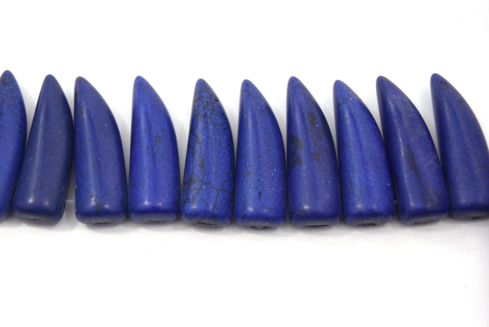 31mm Indigo Purple Howlite Bullet/Tusk Shaped Beads with 1mm Holes - (Approx. 15.5" Strand ~ 39 Beads)