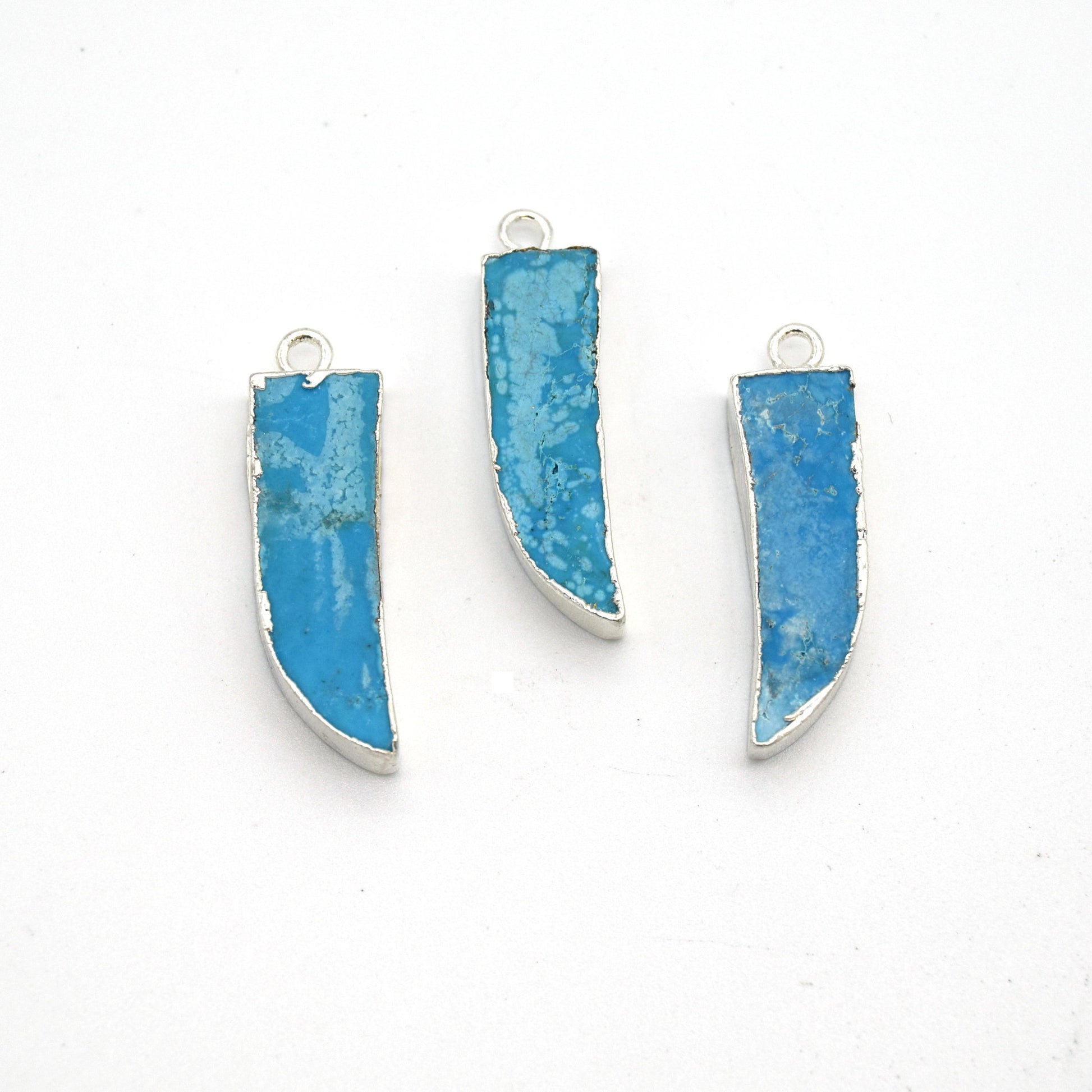 7mm x 22mm Silver Plated Tusk/Fang/Horn Shaped Natural Reconstituted Turquoise Pendant