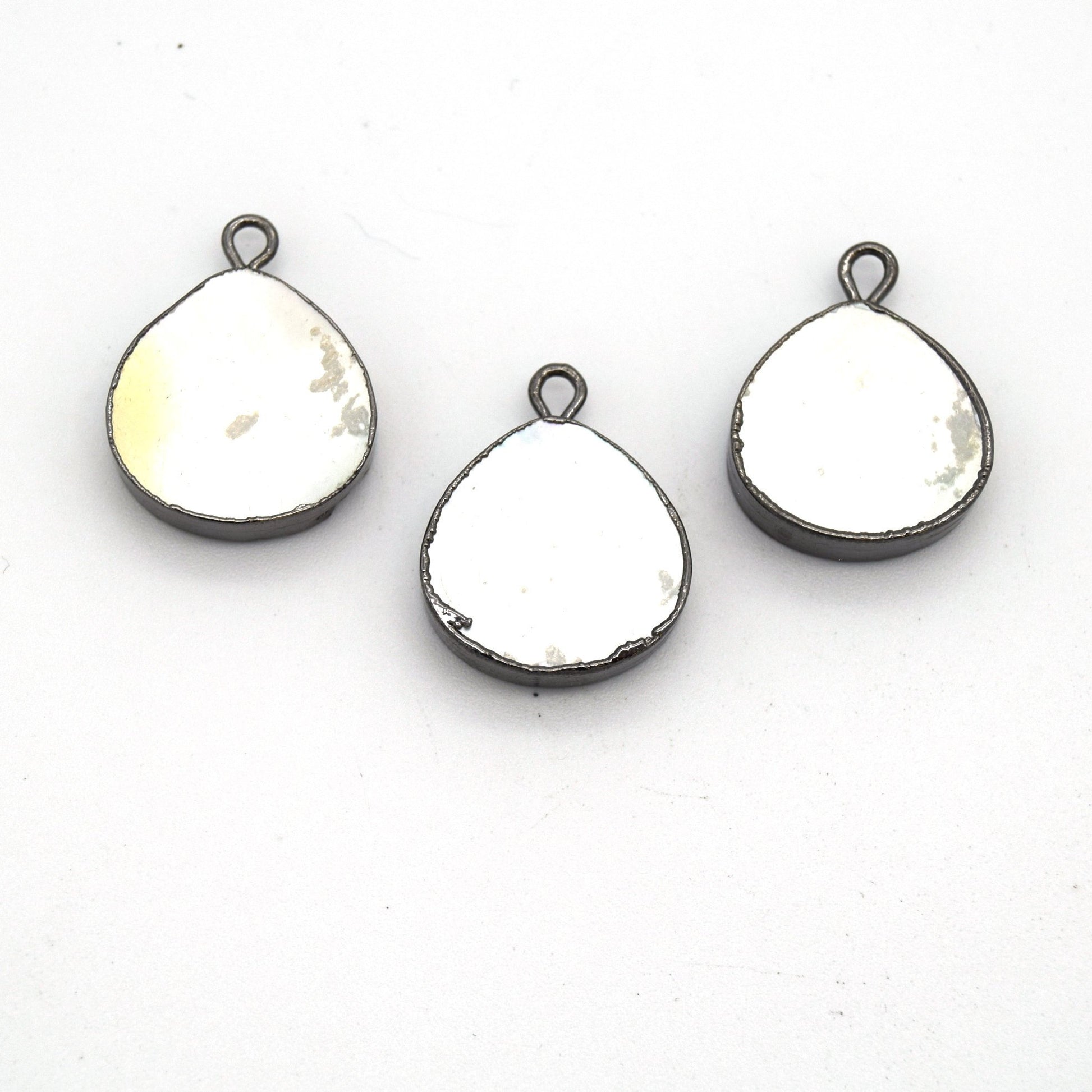 14mm x 15mm Gunmetal Plated Flat Teardrop/Heart Shaped Iridescent White Abalone Pendant