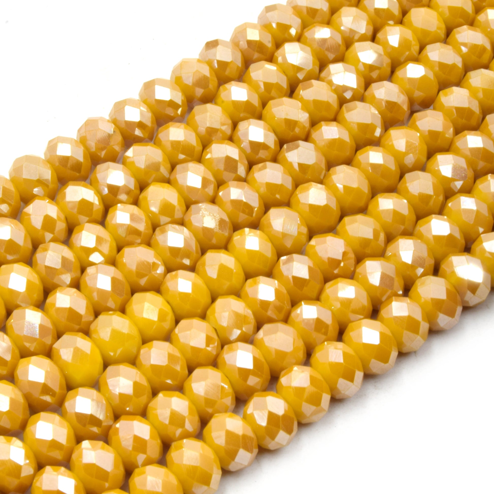 Filo perle in cristallo sfaccettato colore oro antico Filo perle in cristallo sfaccettato colore oro antico