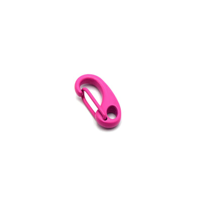 A large, neon pink enamel lobster claw clasp used for making jewelry and other craft projects.