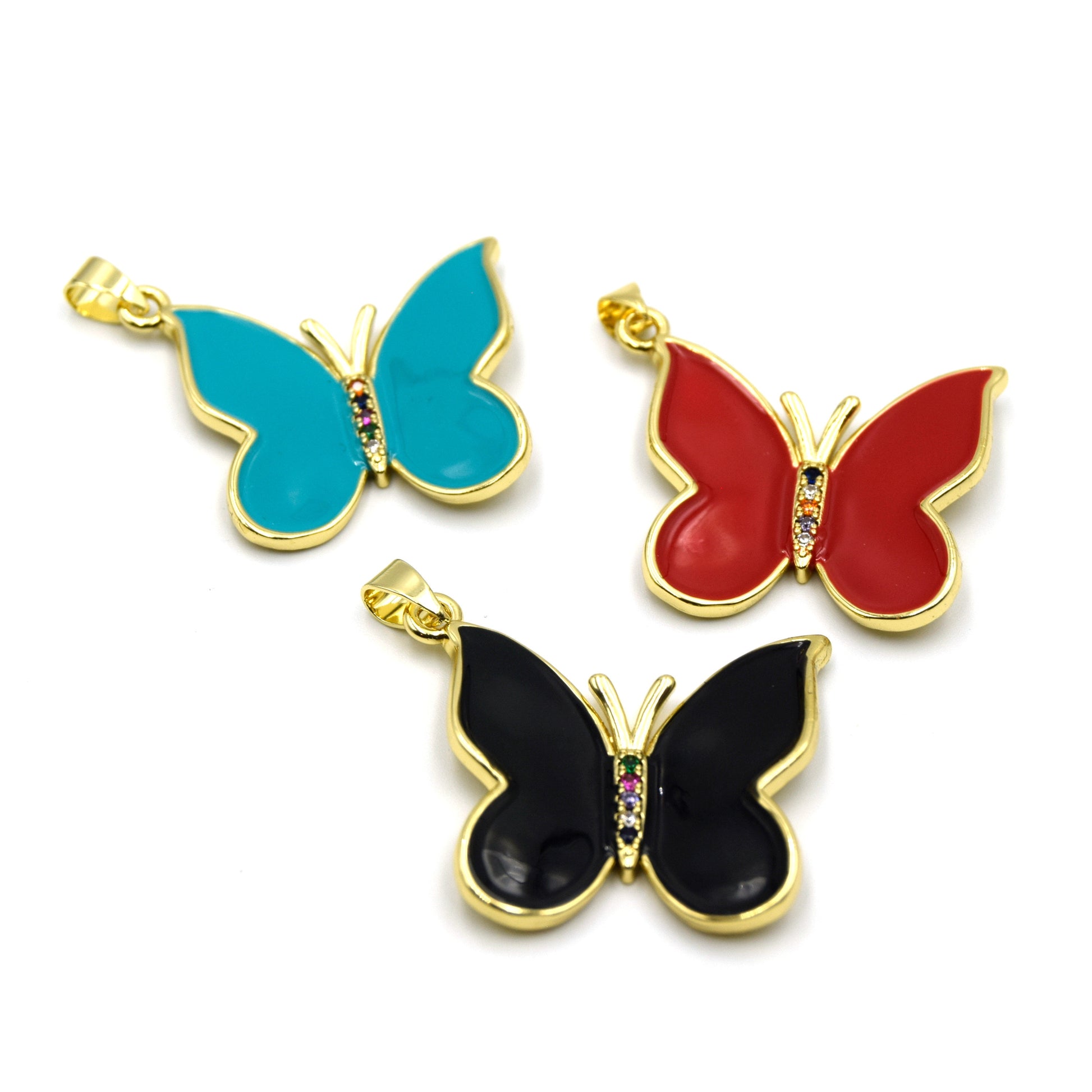 hese 28mm Plated Copper and Enamel Butterfly Pendants for Necklaces and Jewelry are perfect for adding a touch of color and whimsy to any outfit. The copper has been plated with a beautiful gold color and then enameled with vibrant colors.