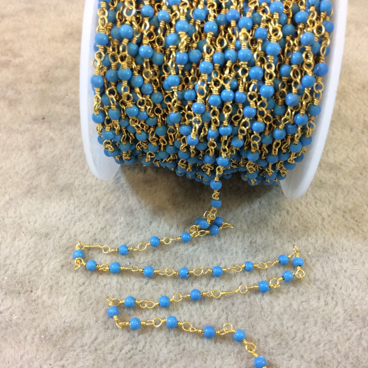 Gold Plated Wrapped Copper Rosary Chain with Smooth 2mm Round Shaped Dyed Sky Blue Howlite Beads - Sold in 1' Increments - (CH013-GD)