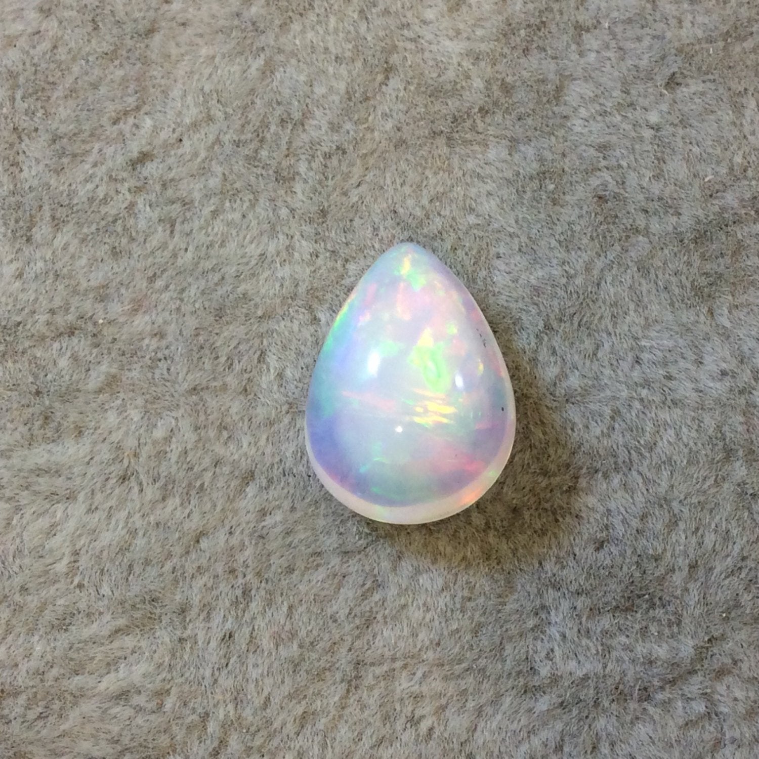 OOAK Smooth Pear/Teardrop Blue Rainbow Pinfire Ethiopian Opal Semi-Precious Gemstone Cabochon "1115P"- Measuring 10.9mm x 15.2mm x 6.9mm