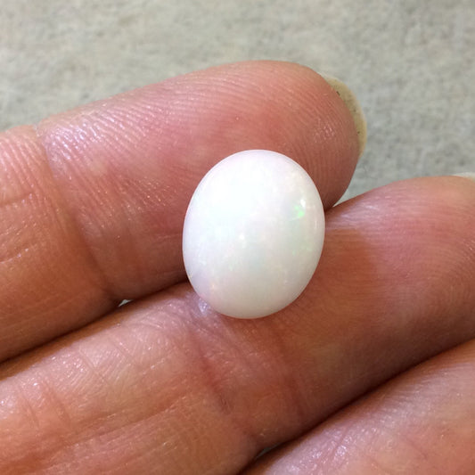 High Quality Smooth Oval Red/Green Pinfire Ethiopian Opal Semi-Precious Gemstone Cabochon "1014OA" - Measuring 10.9mm x 13.2mm x 5.8mm