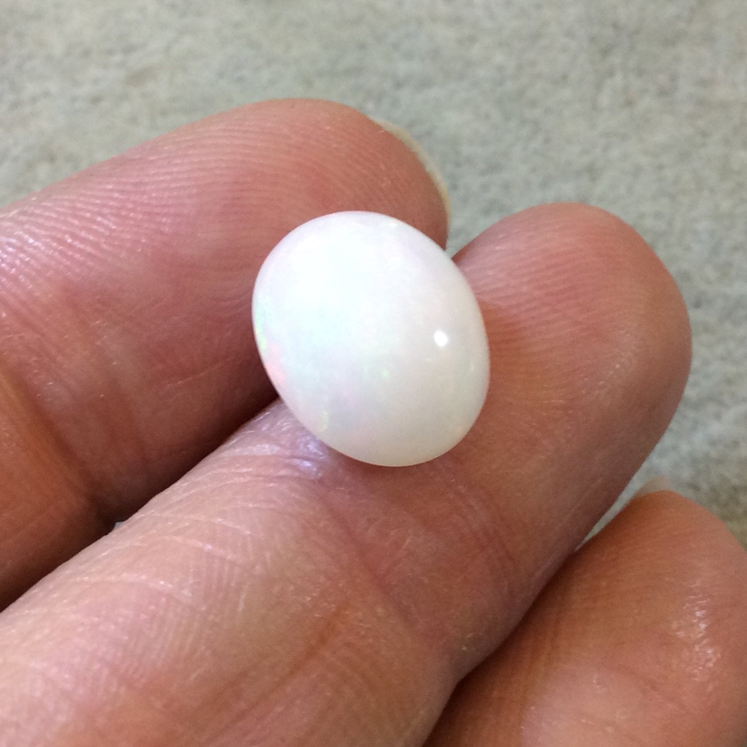 High Quality Smooth Oval Red/Green Pinfire Ethiopian Opal Semi-Precious Gemstone Cabochon "1014OA" - Measuring 10.9mm x 13.2mm x 5.8mm