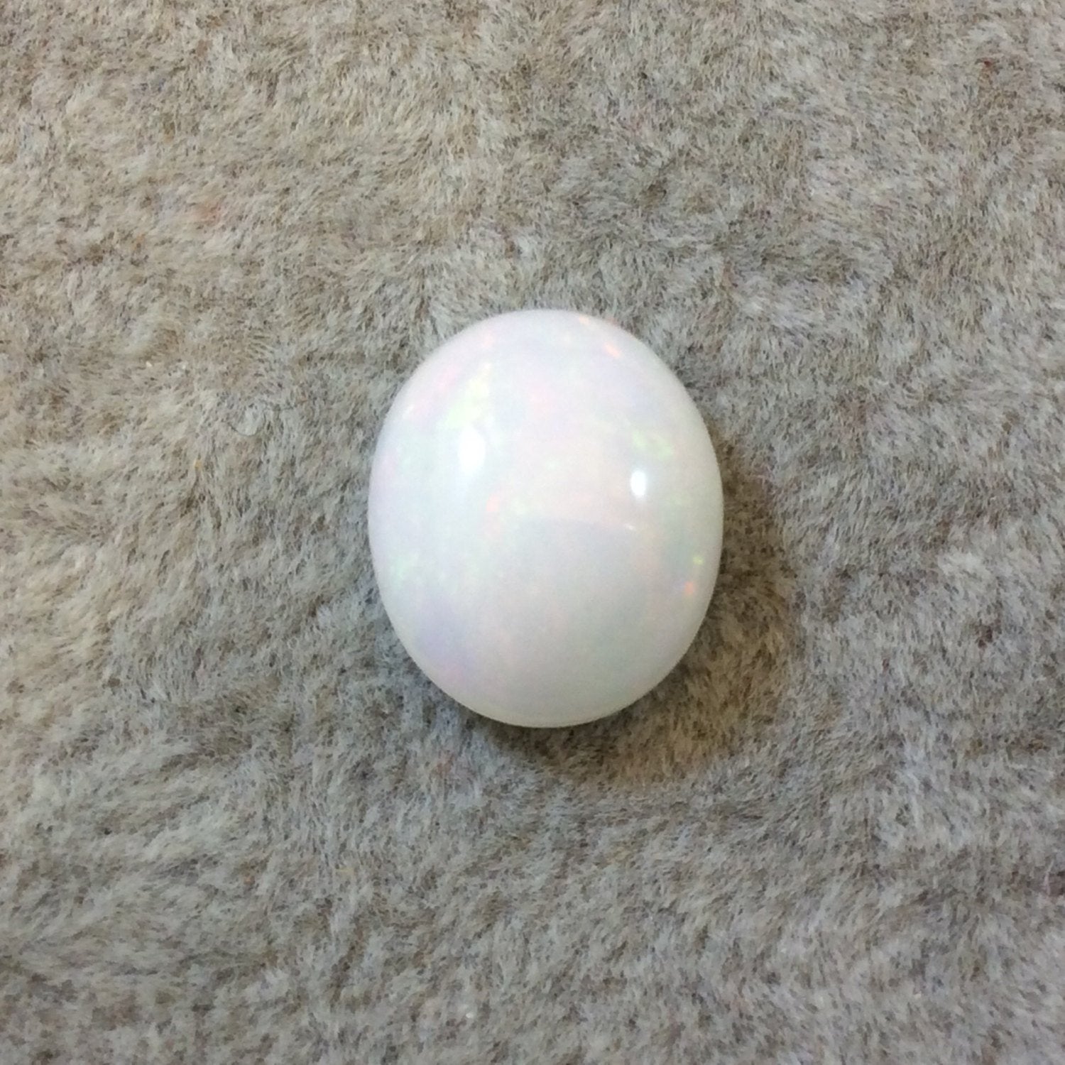 High Quality Smooth Oval Red/Green Pinfire Ethiopian Opal Semi-Precious Gemstone Cabochon "1014OA" - Measuring 10.9mm x 13.2mm x 5.8mm