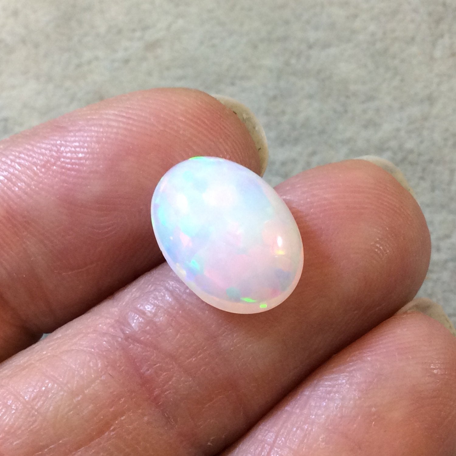 High Quality Smooth Oval Rainbow Pinfire Ethiopian Opal Semi-Precious Gemstone Cabochon "1014OB"- Measuring 10.5mm x 13.9mm x 5.3mm