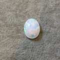 High Quality Smooth Oval Rainbow Pinfire Ethiopian Opal Semi-Precious Gemstone Cabochon "1014OB"- Measuring 10.5mm x 13.9mm x 5.3mm