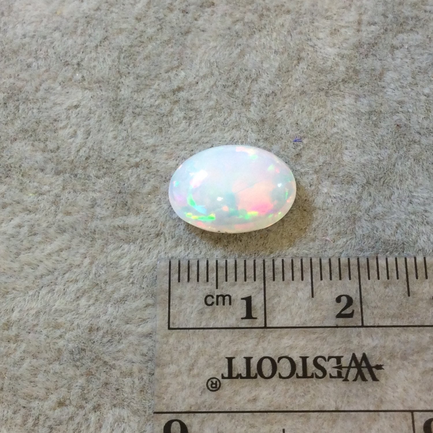 High Quality Smooth Oval Rainbow Pinfire Ethiopian Opal Semi-Precious Gemstone Cabochon "1014OB"- Measuring 10.5mm x 13.9mm x 5.3mm