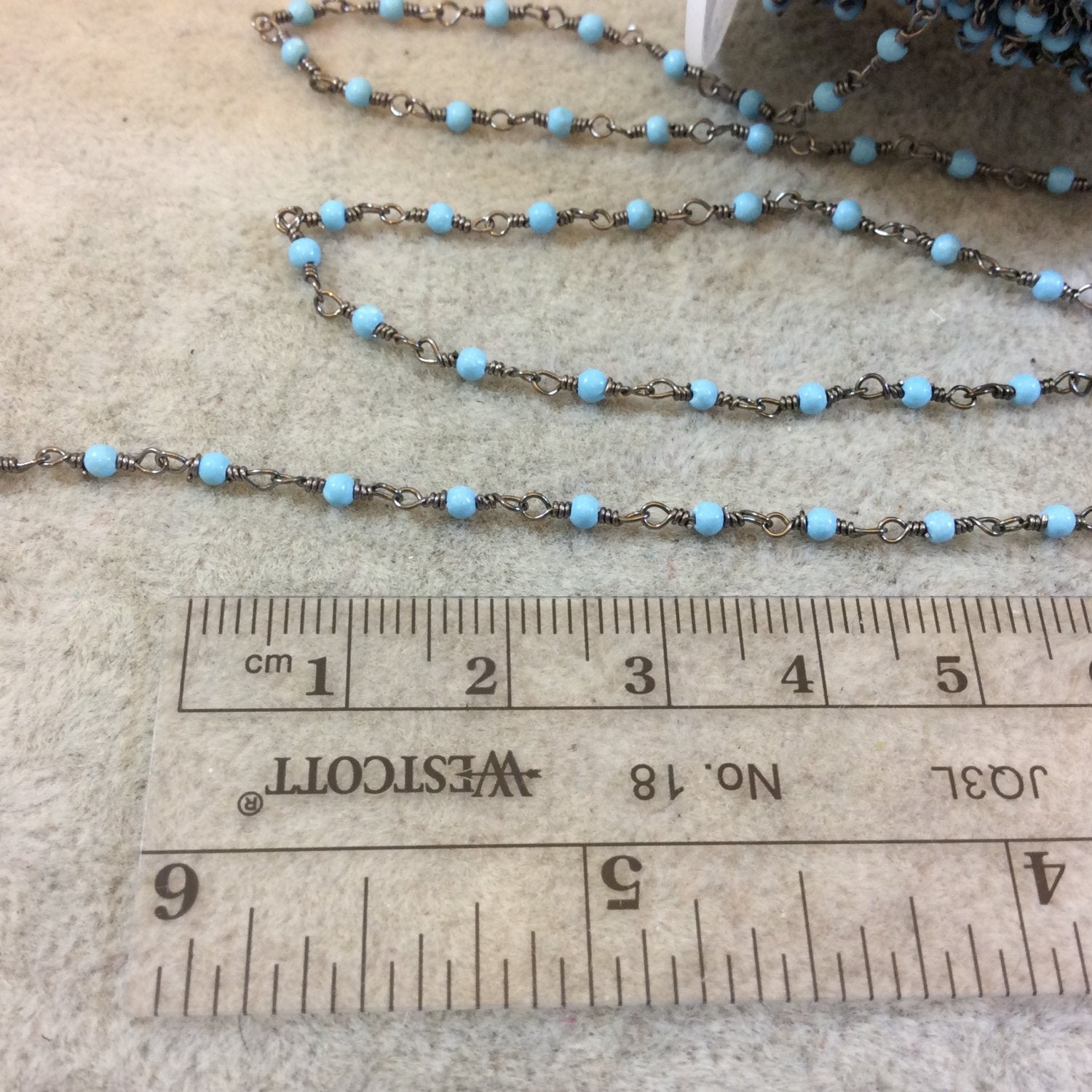 Gunmetal Plated Wrapped Copper Rosary Chain with Smooth 2mm Round Shaped Dyed Light Blue Howlite Beads - Sold in 1' Increments - (CH009-GM)
