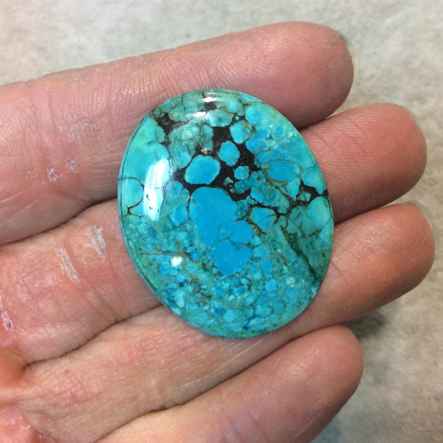 Chinese Stabilized Turquoise Oblong Oval Shaped Flat Back Cabochon - Measuring 29mm x 36mm, 4mm Dome Height - Natural High Quality Gemstone