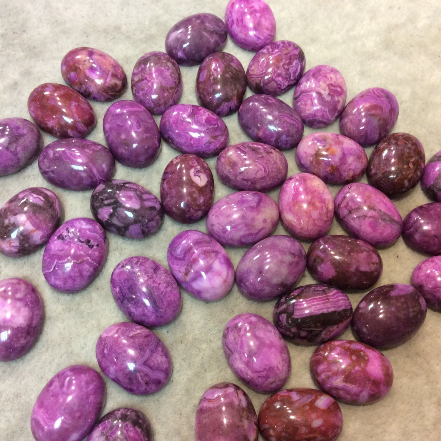 Dyed Magenta Crazy Lace Agate Oval Shaped Flat Back Cabochon - Measuring 12mm x 16mm, 5-6mm Dome Height - Sold Individually, Chosen Randomly