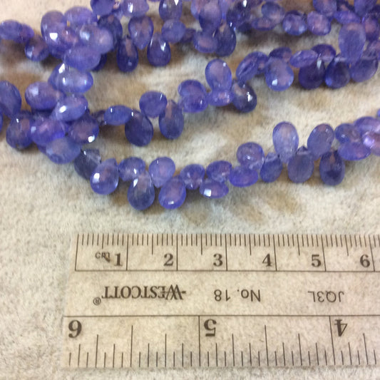 6mm x 8mm Faceted Teardrop Shaped Tanzanite Beads - 9" Strand (Approx. 63 Beads) - High Quality Hand-Cut Indian Semi-Precious Gemstone