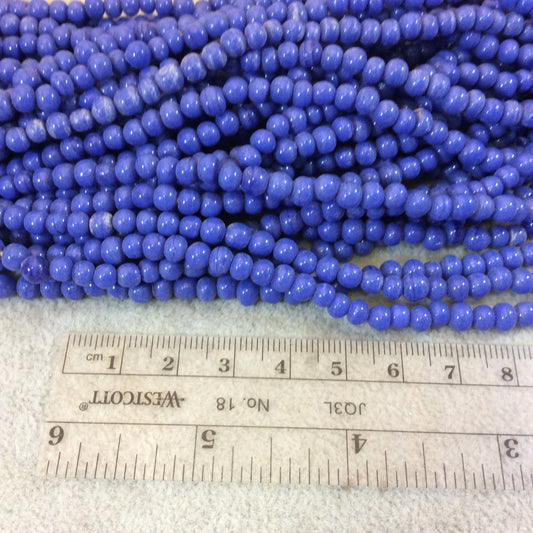 4mm Glossy Cornflower Blue Quality Irregular Rondelle Shape Indian Ceramic Beads - Sold by 16.25" Strand - Approximately 98 Beads