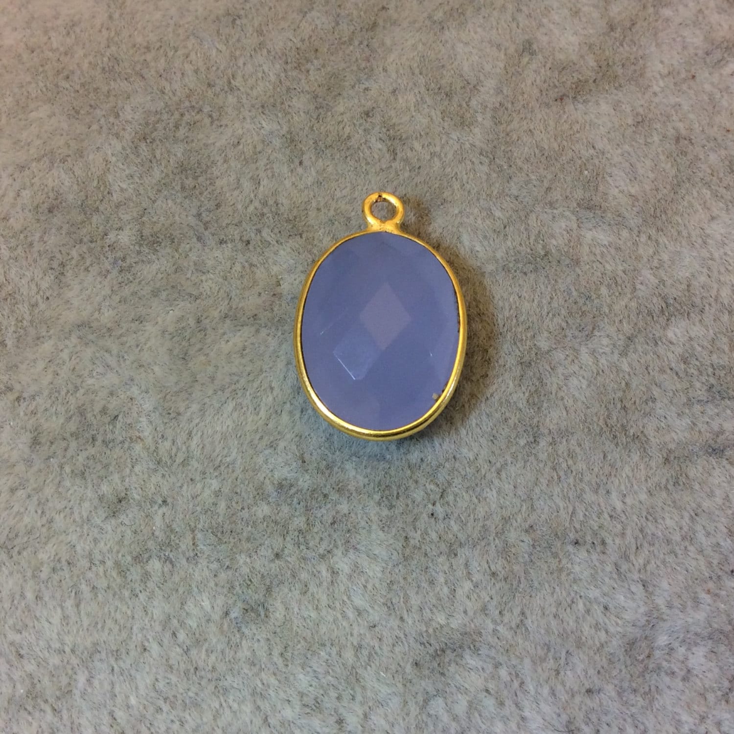 Gold Finish Faceted Semi-Transparent Pale Blue Chalcedony Vertical Oval Shaped Bezel Pendant - Measuring 12mm x 16mm - Natural Gemstone