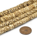 light brown carved heishi