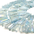 A set of steel blue aura quartz stick beads, perfect for jewelry making or crafting projects.