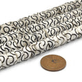 white carved heishi