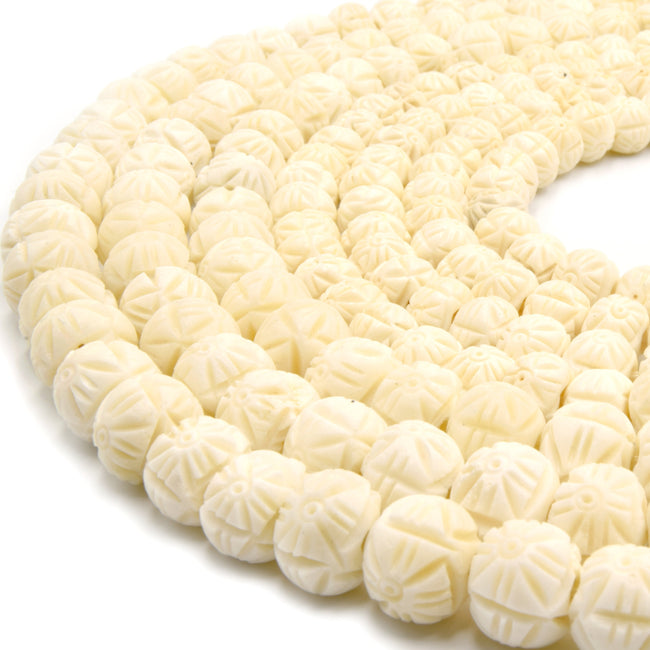 white carved rondelle bone beads